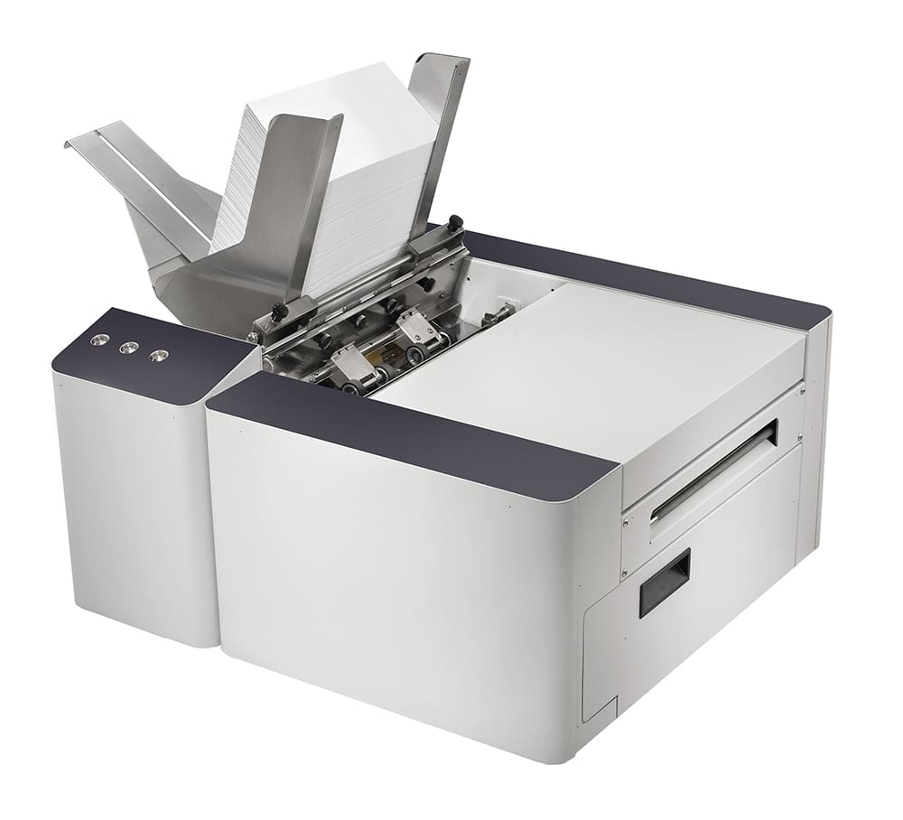 Image of a Quadient Mach-5 address printer. The printer, known for its high-speed and precision, is displayed in a clear and detailed manner, showcasing its sleek design and advanced features that make it an essential tool for efficient mail processing.