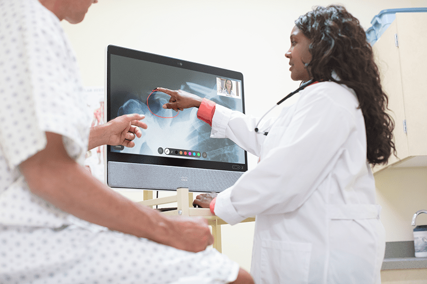 doctor and patient viewing an x-ray - healthcare Webex image