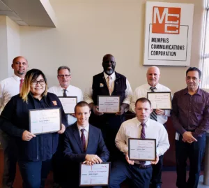 Image of MCC document solutions service technicians displaying their Xerox certifications