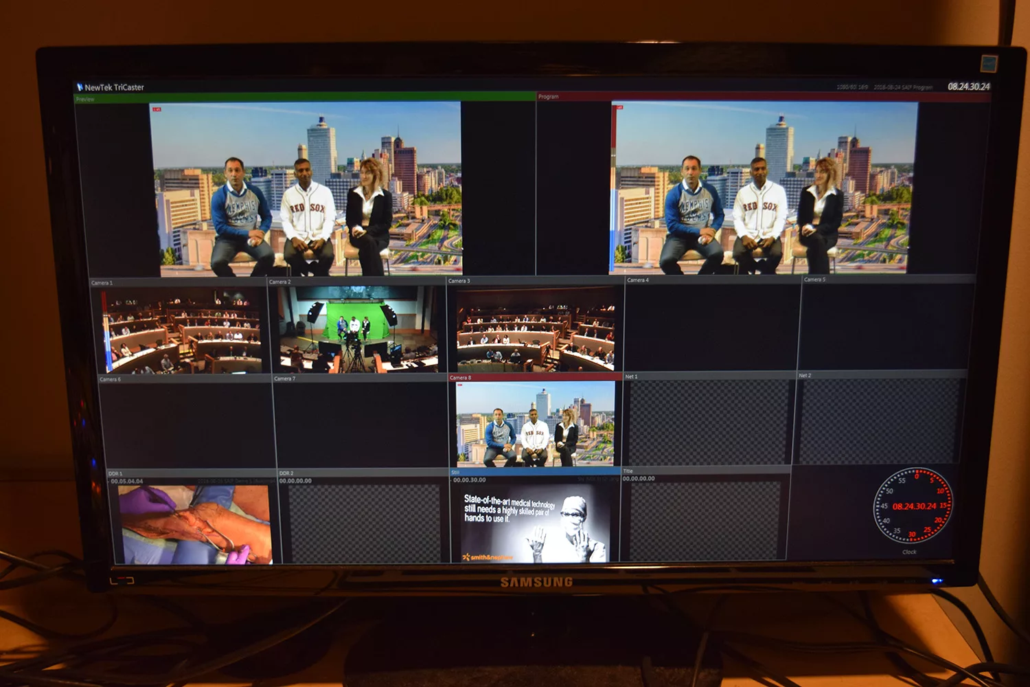 Image of a computer screen displaying the NewTek TriCaster software in action, demonstrating its capabilities for real-time video production. Various windows within the software are open, showing different aspects of the production process. This image provides a glimpse into the advanced technology used in MCC's Corporate Video Production Services, emphasizing their cutting-edge resources.
